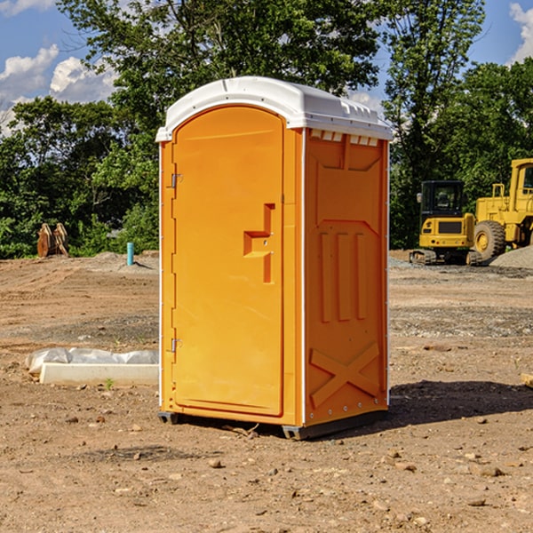 how often are the porta potties cleaned and serviced during a rental period in Harrisonville